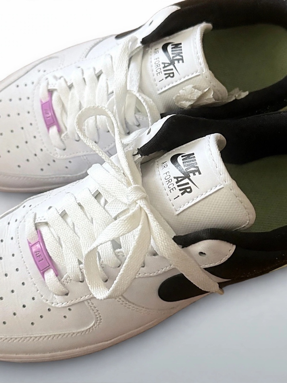 Nike Women's White and Black Sneakers with Green Accents